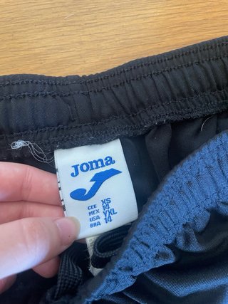 Pantalones chándal Joma negros y verdes