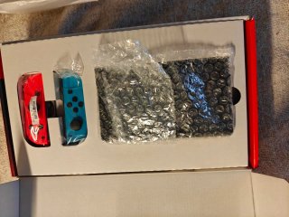 Nintendo Switch Azul y Rojo + Más mando acoplable