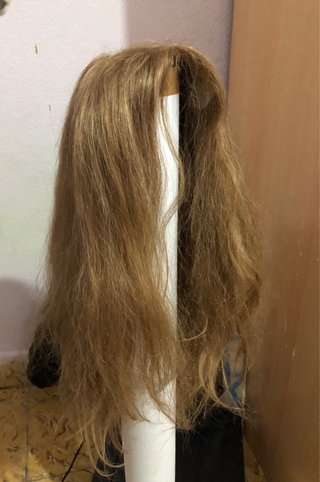 Peluca de cabello 100% natural con firma.
