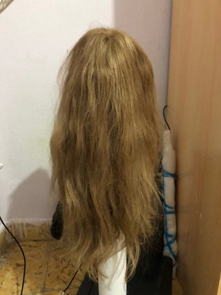 Peluca de cabello 100% natural con firma.