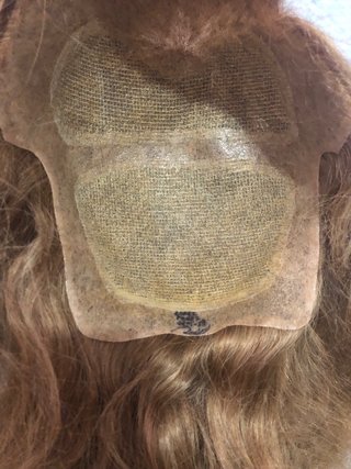 Peluca de cabello 100% natural con firma.