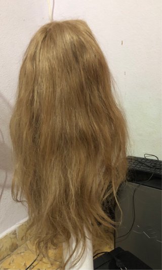 Peluca de cabello 100% natural con firma.
