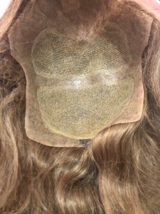 Peluca de cabello 100% natural con firma.