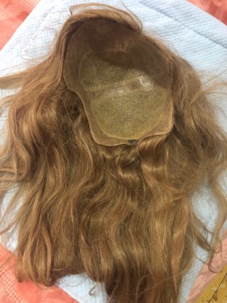 Peluca de cabello 100% natural con firma.
