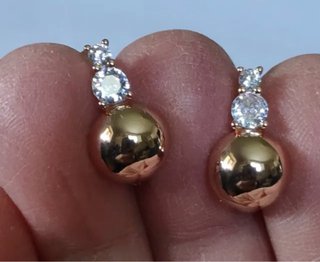 Orecchini sfera oro e punto luce
