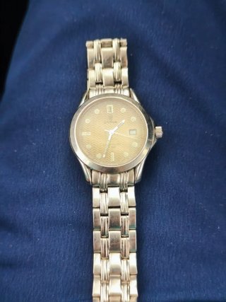 Reloj CYMA oro y plata