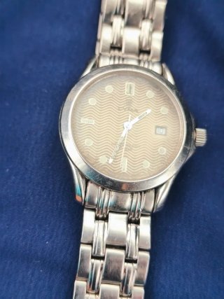 Reloj CYMA oro y plata