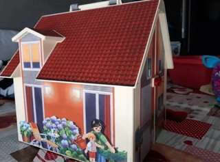 Casa Playmobil con figuras y accesorios