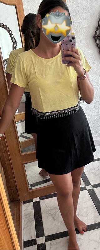 Camiseta amarilla con flecos