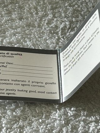 Anello Stroili dorato a fascia con zirconi