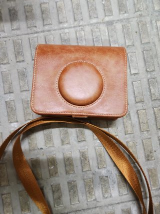 Funda cámara cuero marrón con correa