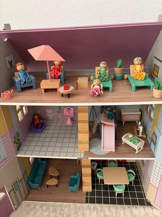 Casa de muñecas de madera