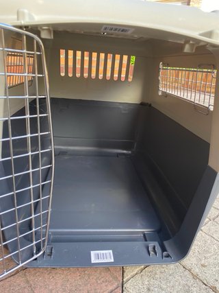 Transportín para perro gris y blanco