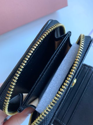 Cartera Miu Miu acolchada negra