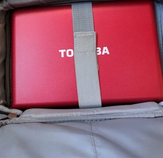 Toshiba NB510-10D rojo+ cargador+ funda..