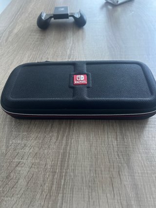 Nintendo Switch + joy cons + dock tv + grip +funda