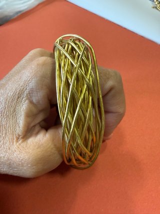 Bracciale rigido intrecciato oro
