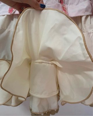 Traje de flamenca rosa y beige