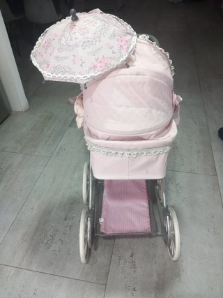 Cochecito de muñecas vintage floral