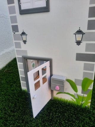Casa de muñecas de madera