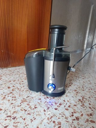 Extractor de zumos plateado