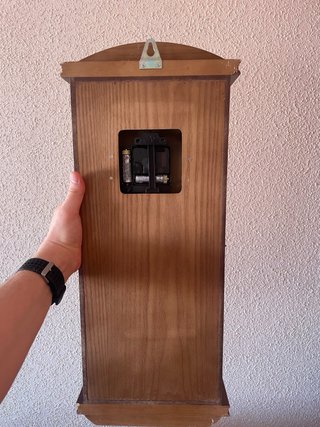 Reloj de pared antiguo madera tallada