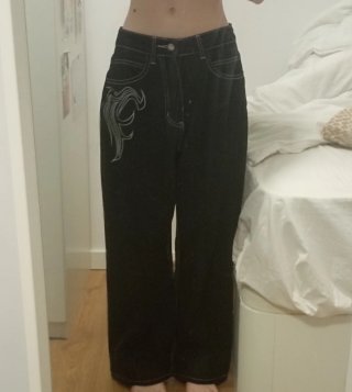 Pantalones anchos negros con bordado