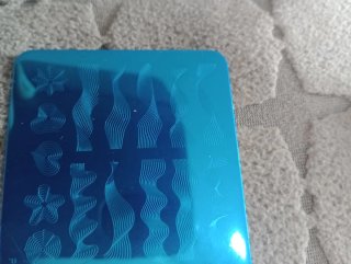 Piastra per stamping unghie