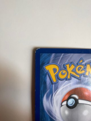 Carta Pokémon Charizard EX XY 121