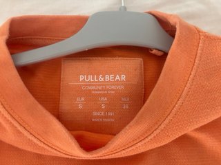 Felpa arancione pesca Pull and Bear con scollo tondo