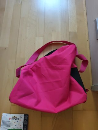 Bolsa y protecciones patines Oxelo rosa
