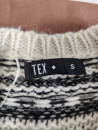Jersey de punto con flecos