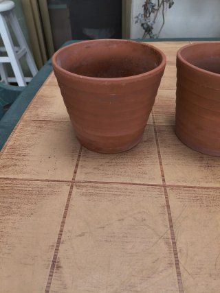 2 maceteros de terracota