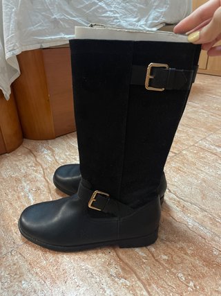 Botas altas negras con hebilla