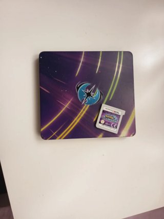 Pokémon Ultraluna con Cartucho Metálico