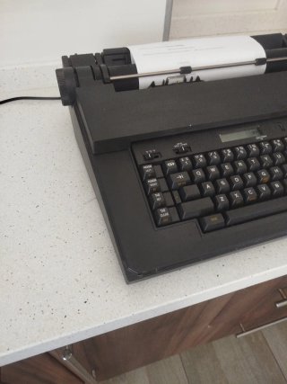 Maquina de escribir electrica olivetti