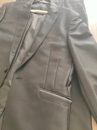 Traje de vestir hombre negro.