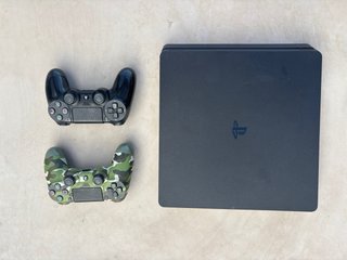 PS4 Slim 1TB + 2 Mandos + ARK
