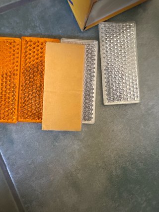Catadióptricos Rinder Naranja y Blanco