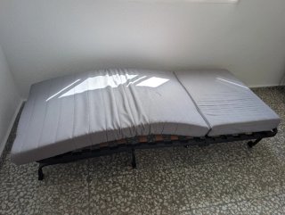 Sillón cama portátil gris