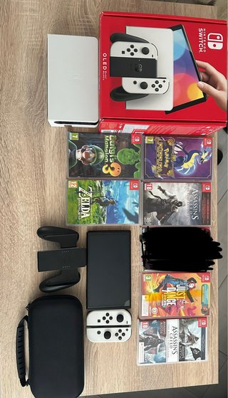 Nintendo Switch OLED + 5 Juegos