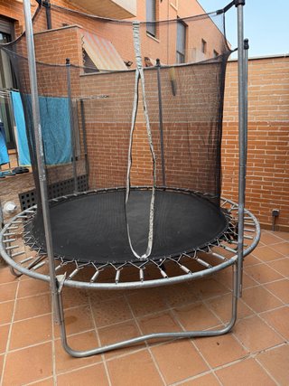Cama elástica con red de seguridad