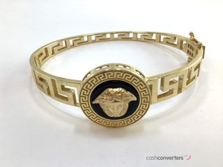 brazalete oro 18k con piedra con onix