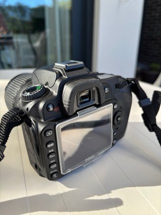 Nikon D90+Lente 18-105mm VR/1.986 disparos+mochila