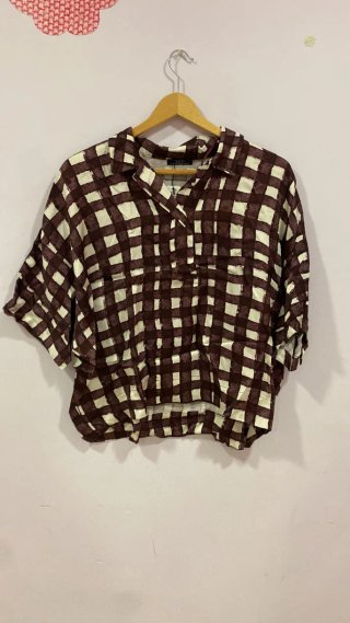 Camisa de cuadros beige y marrón