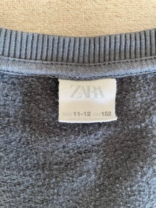 Sudadera Zara niña muñeca lentejuelas