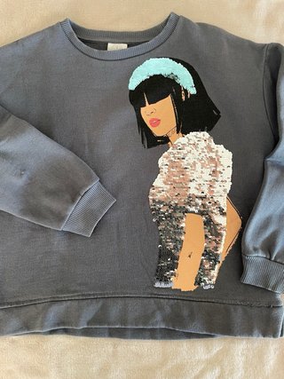 Sudadera Zara niña muñeca lentejuelas