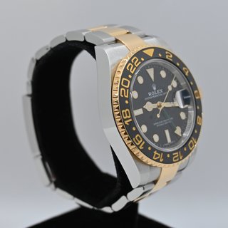 Rolex GMT-Master II Acero/Oro Negro