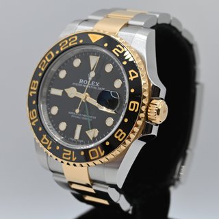 Rolex GMT-Master II Acero/Oro Negro