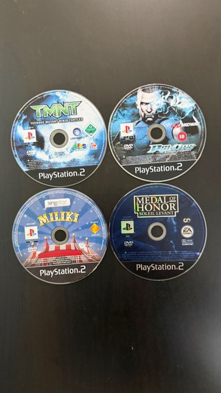 Playstation 2 Slim Negra + 4 Juegos y mando